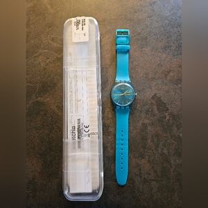 Swatch watch TURQUOISE REBEL SUOL700 Day date